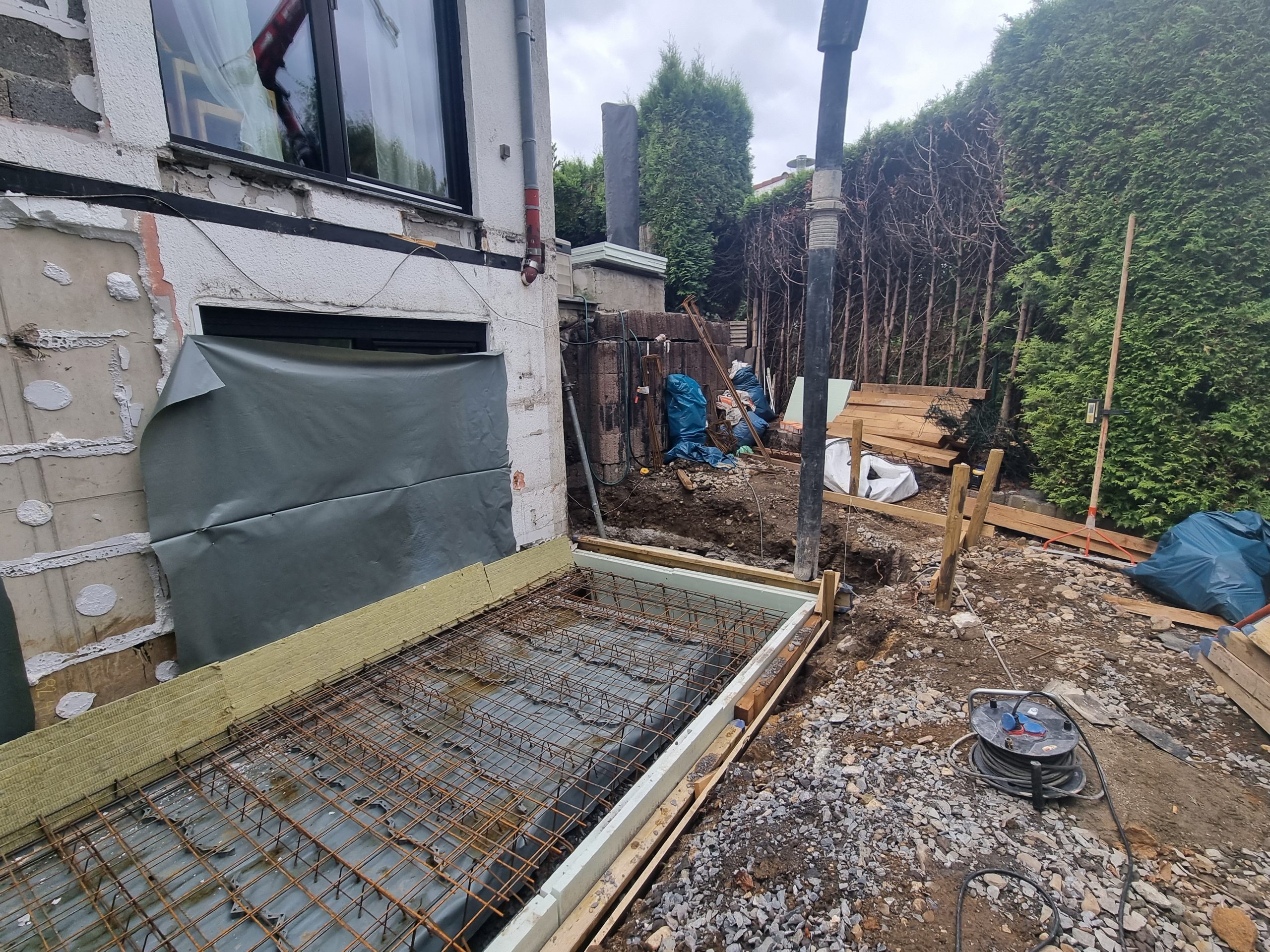 depth-of-field-photo-of-man-sitting-on-chair-while-holding-1600x900px