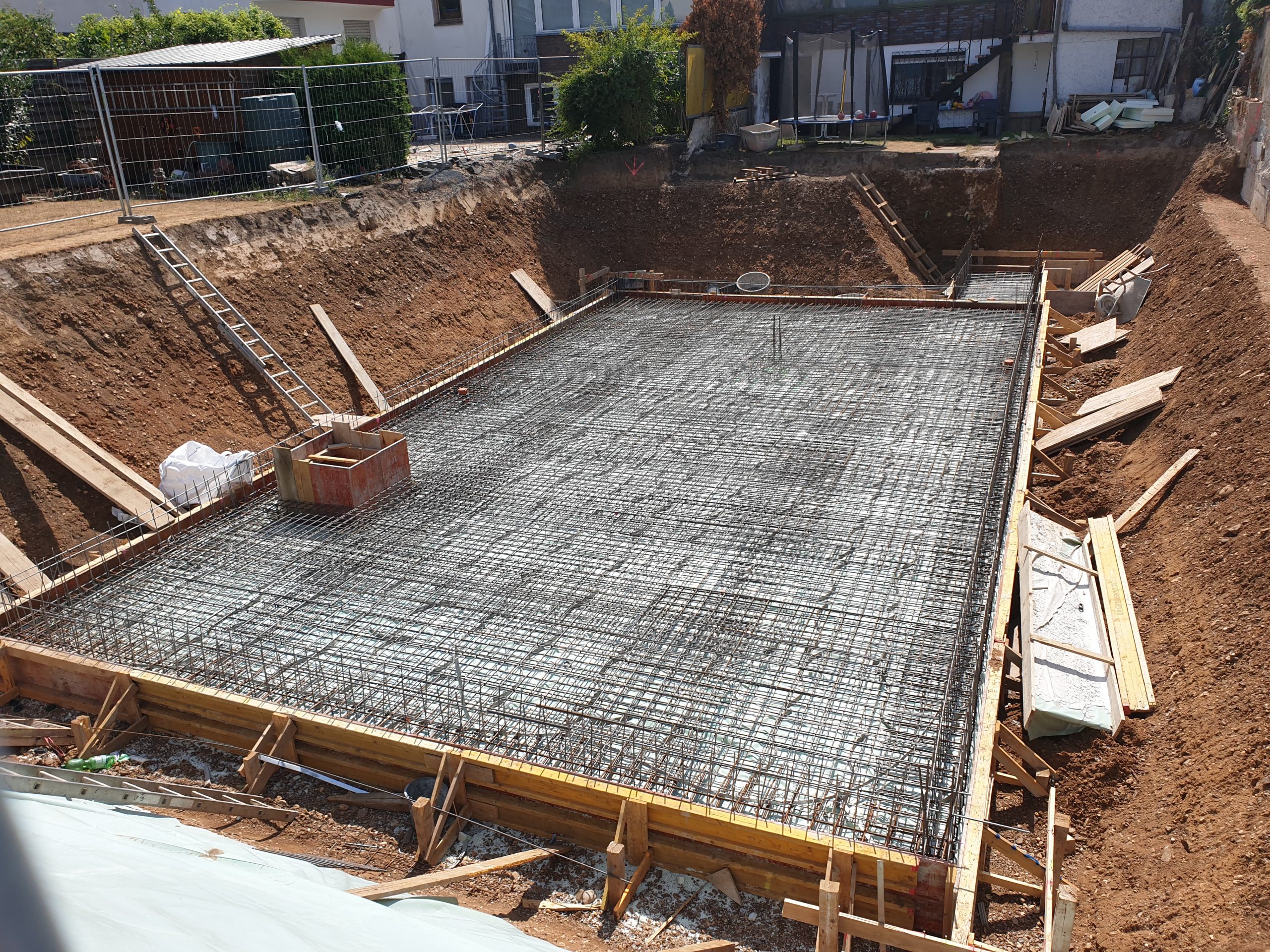 depth-of-field-photo-of-man-sitting-on-chair-while-holding-1600x900px