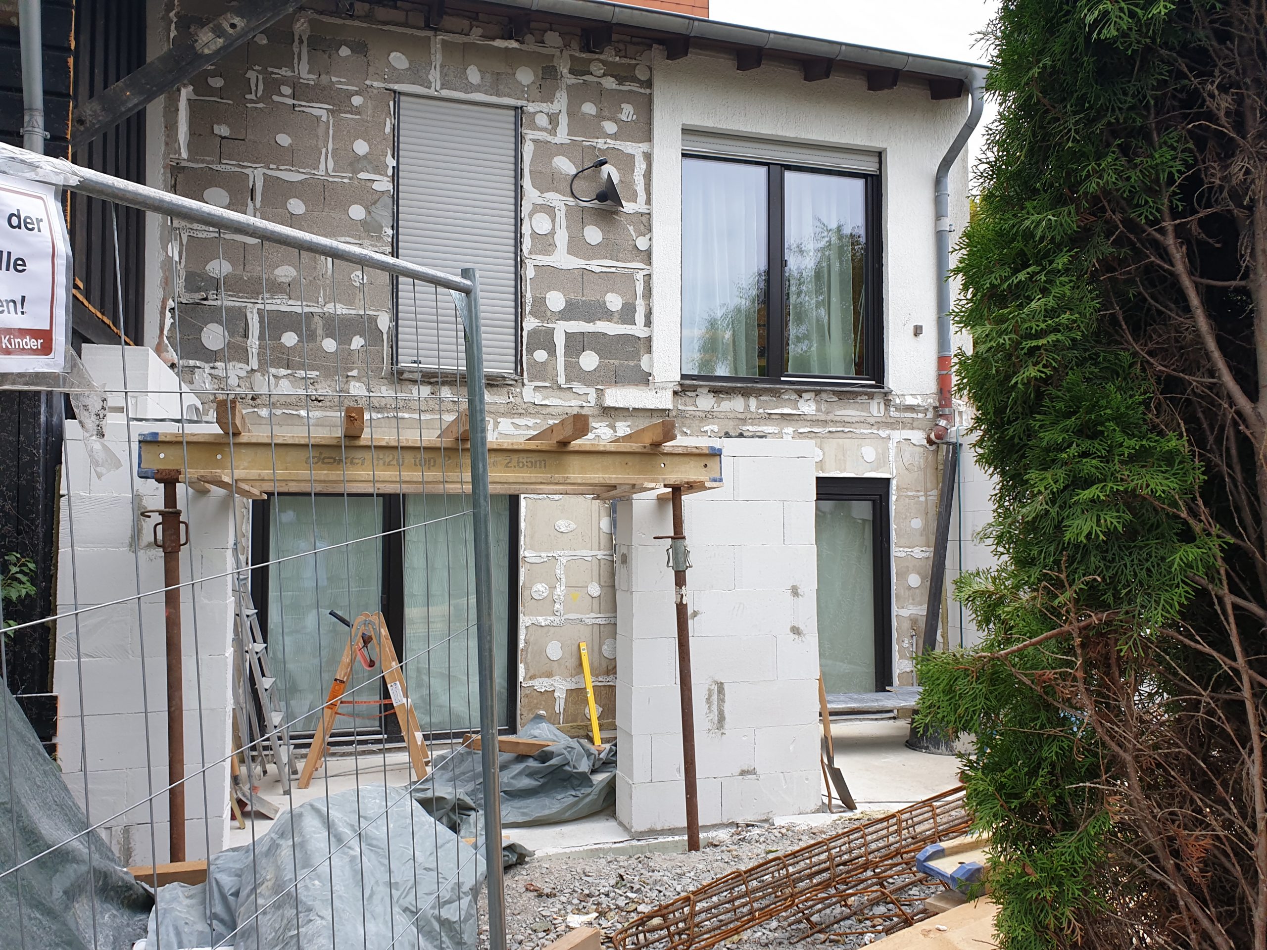 depth-of-field-photo-of-man-sitting-on-chair-while-holding-1600x900px