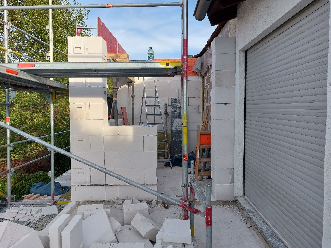 depth-of-field-photo-of-man-sitting-on-chair-while-holding-1600x900px