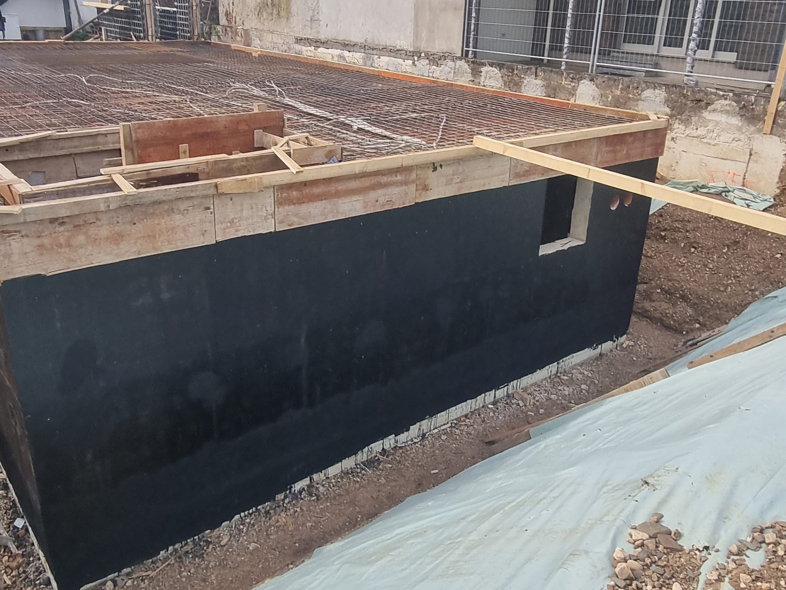 depth-of-field-photo-of-man-sitting-on-chair-while-holding-1600x900px