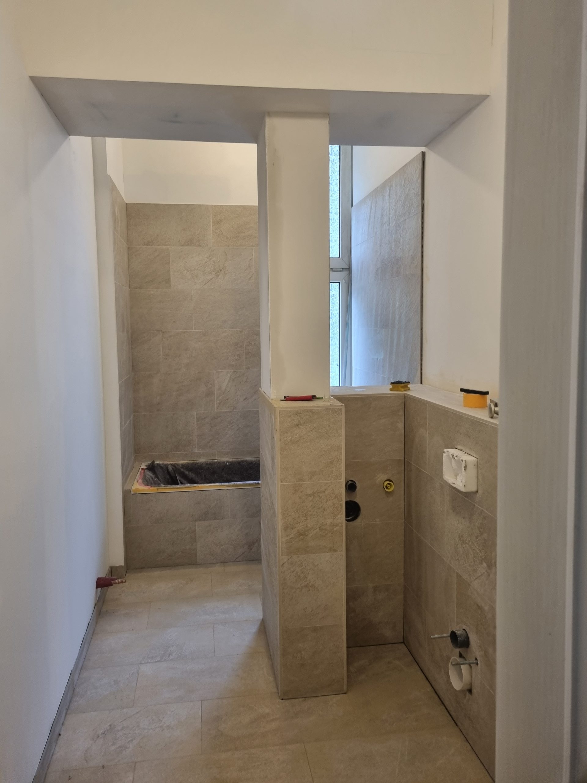 depth-of-field-photo-of-man-sitting-on-chair-while-holding-1600x900px