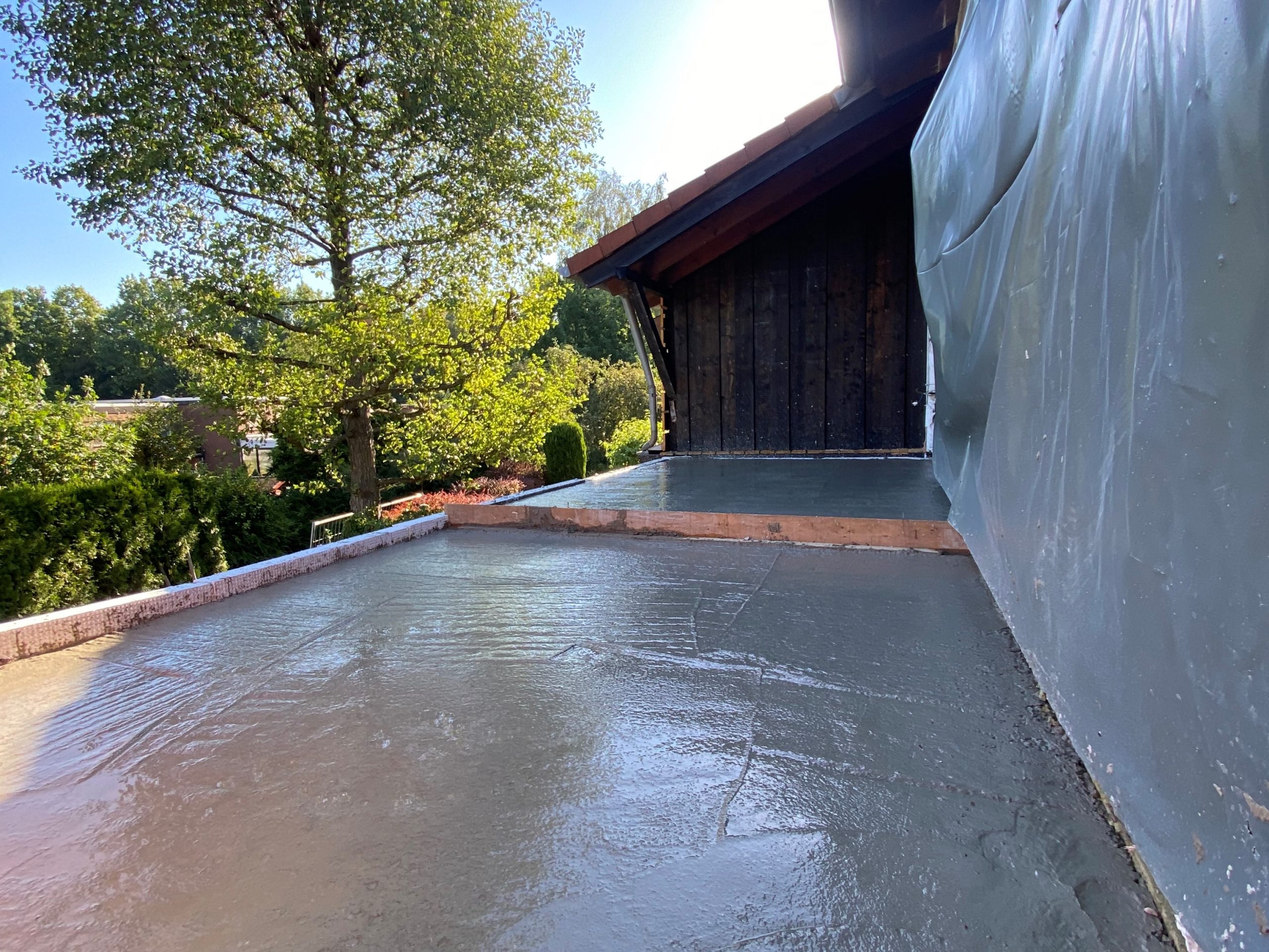 depth-of-field-photo-of-man-sitting-on-chair-while-holding-1600x900px