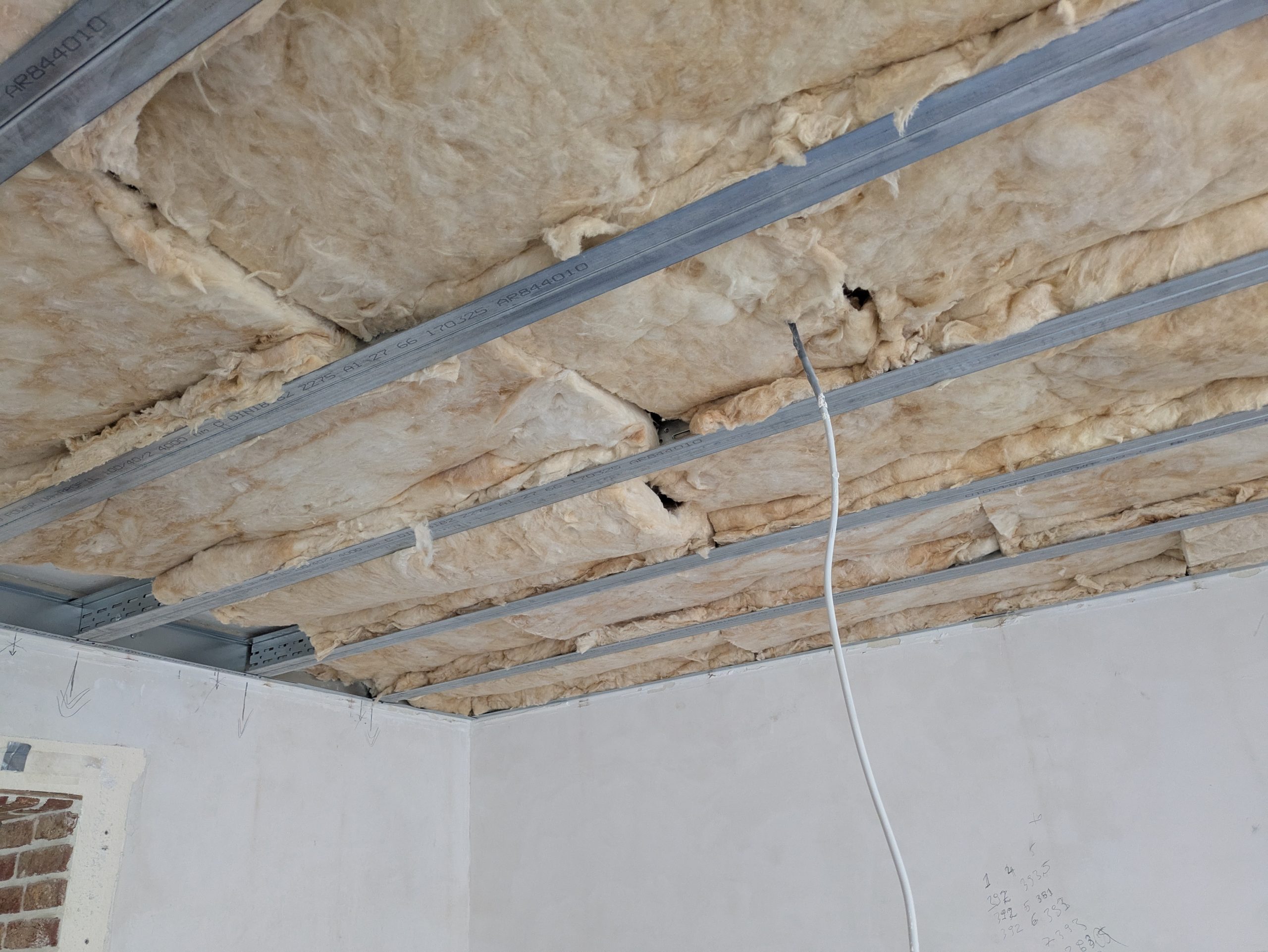 depth-of-field-photo-of-man-sitting-on-chair-while-holding-1600x900px