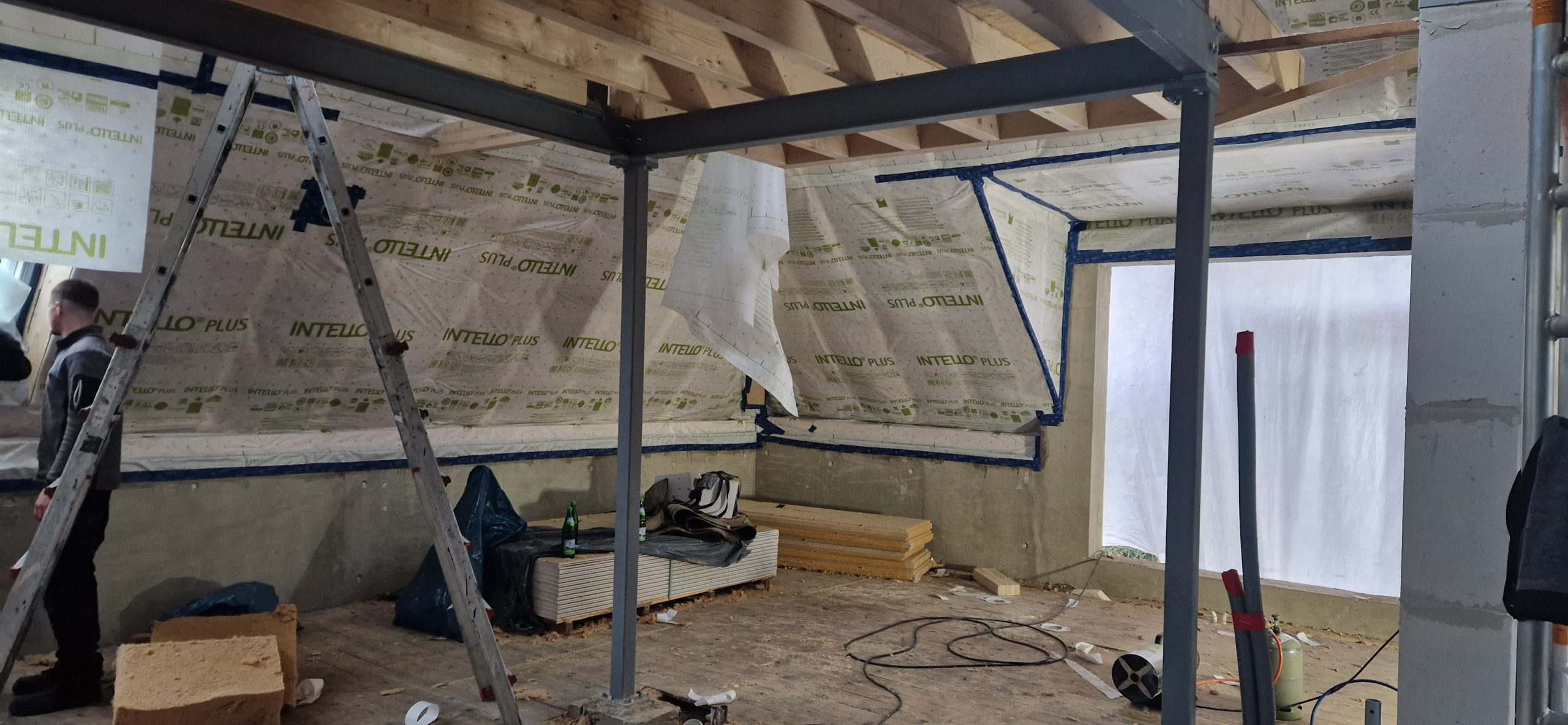 depth-of-field-photo-of-man-sitting-on-chair-while-holding-1600x900px